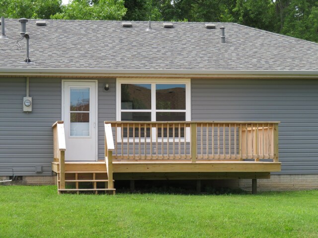 1007 E Parkview St, Ozark, MO 65721 - rear view of house featuring a deck, a lawn, and roof with shingles