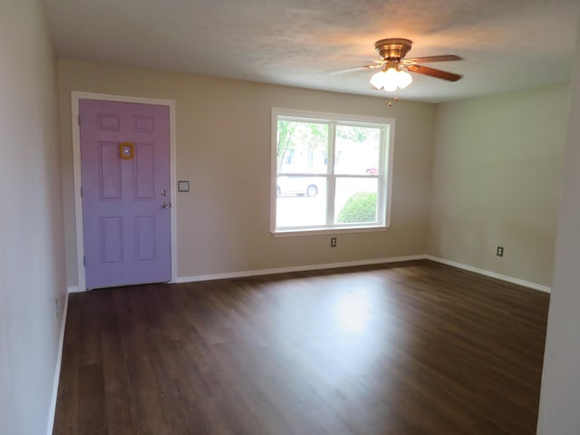 1007 E Parkview St, Ozark, MO 65721 - unfurnished room featuring dark wood-type flooring and a ceiling fan