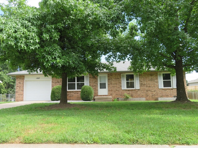 1007 E Parkview St, Ozark, MO 65721 - view of front of home with brick siding, an attached garage, concrete driveway, entry steps, and crawl space