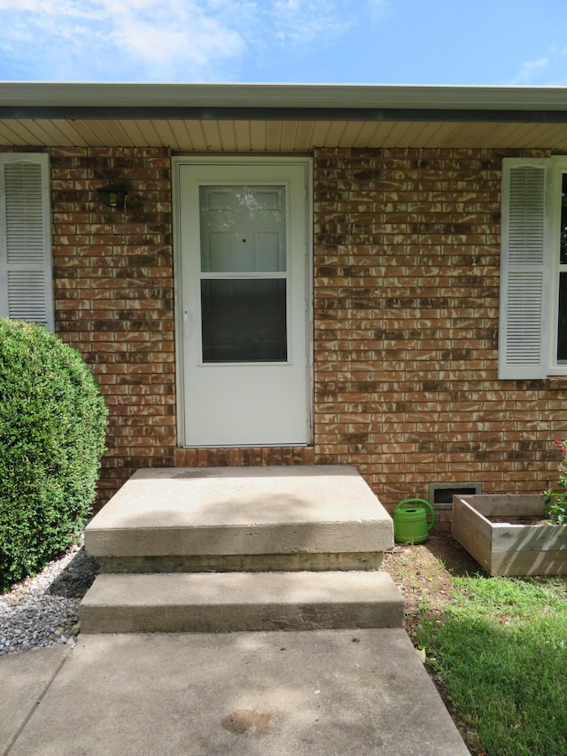 1007 E Parkview St, Ozark, MO 65721 - property entrance featuring brick siding