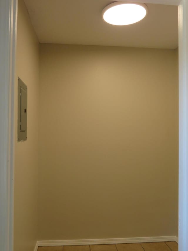 1007 E Parkview St, Ozark, MO 65721 - laundry room with electric panel and light tile patterned floors