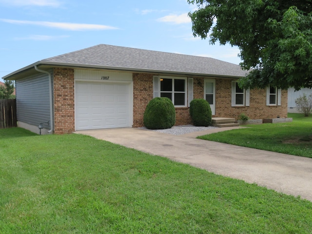 1007 E Parkview St, Ozark, MO 65721 - single story home featuring driveway, brick siding, an attached garage, and a shingled roof