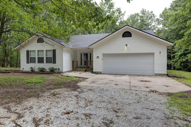 1030 Harris Blvd, Ozark, MO 65721 - ranch-style home featuring an attached garage, driveway, and a shingled roof