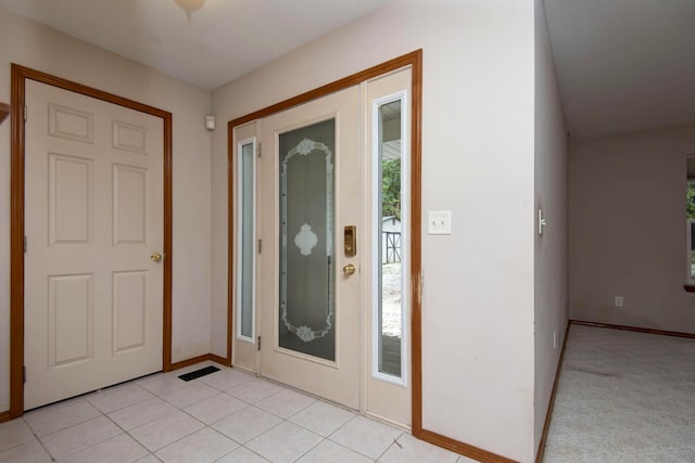 1030 Harris Blvd, Ozark, MO 65721 - foyer entrance with healthy amount of natural light and light tile patterned floors