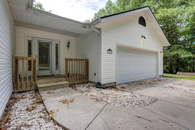 1030 Harris Blvd, Ozark, MO 65721 - view of home's exterior featuring an attached garage and driveway