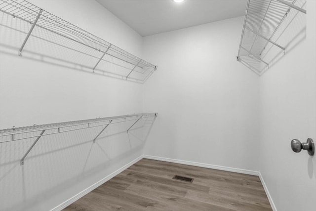 200 E Rosalie St, Strafford, MO 65757 - spacious closet featuring wood finished floors