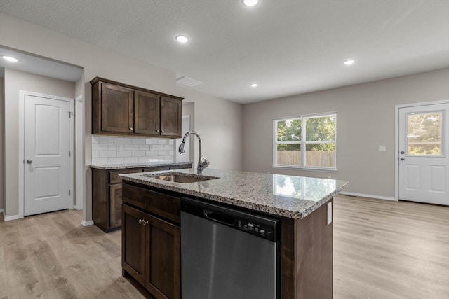 200 E Rosalie St, Strafford, MO 65757 - kitchen with dishwasher, light wood-style floors, light stone counters, decorative backsplash, and dark brown cabinetry