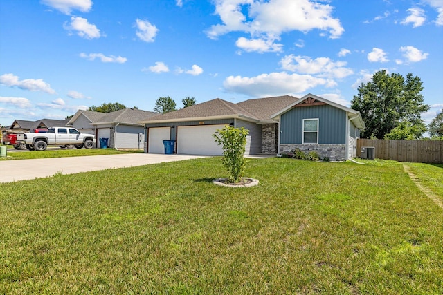 200 E Rosalie St, Strafford, MO 65757 - ranch-style home with board and batten siding, an attached garage, and driveway