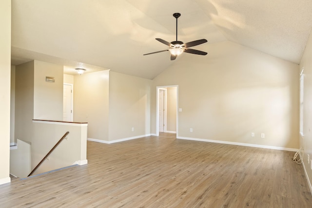 1813 Boswell Ave, Branson, MO 65616 - empty room with ceiling fan, vaulted ceiling, and wood finished floors