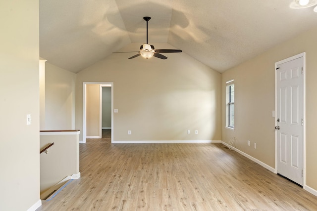 1813 Boswell Ave, Branson, MO 65616 - unfurnished room featuring a ceiling fan, light wood-style floors, and vaulted ceiling