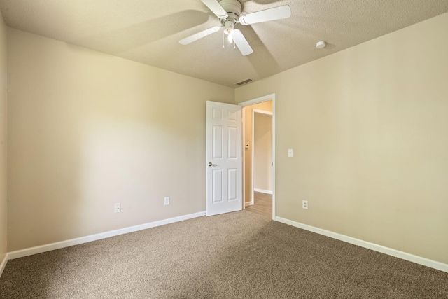 1813 Boswell Ave, Branson, MO 65616 - spare room featuring carpet, ceiling fan, a smoke detector, and a textured ceiling