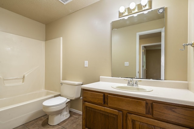 1813 Boswell Ave, Branson, MO 65616 - bathroom with vanity, tile patterned floors, washtub / shower combination, and a textured ceiling