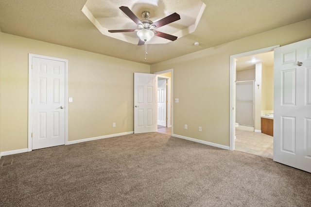 1813 Boswell Ave, Branson, MO 65616 - unfurnished bedroom with carpet, ensuite bath, a textured ceiling, and ceiling fan