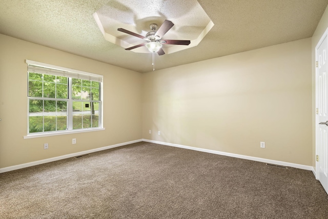 1813 Boswell Ave, Branson, MO 65616 - empty room featuring a textured ceiling, ceiling fan, and dark carpet