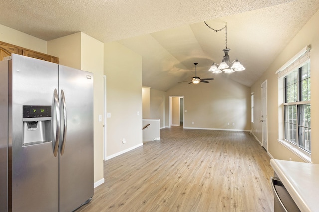 1813 Boswell Ave, Branson, MO 65616 - kitchen featuring stainless steel fridge with ice dispenser, light wood finished floors, a ceiling fan, a chandelier, and pendant lighting