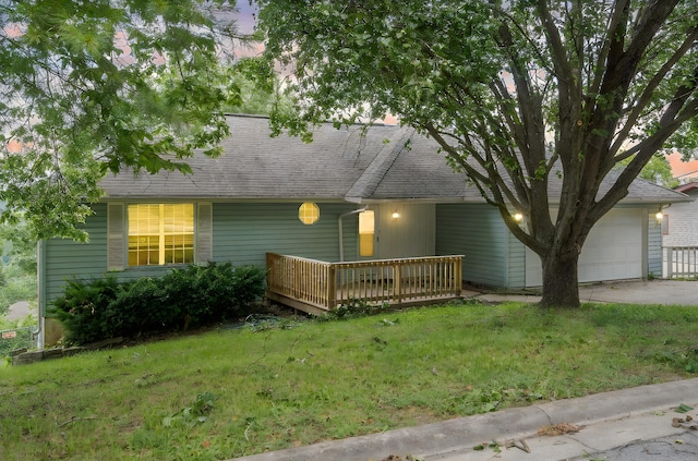 1813 Boswell Ave, Branson, MO 65616 - single story home with an attached garage, a wooden deck, a front lawn, driveway, and roof with shingles