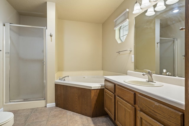 1813 Boswell Ave, Branson, MO 65616 - bathroom with a stall shower, vanity, a garden tub, and tile patterned floors