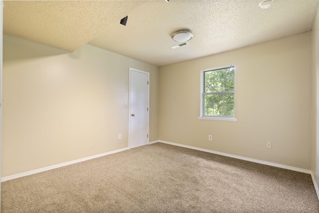 1813 Boswell Ave, Branson, MO 65616 - carpeted empty room featuring a textured ceiling and baseboards
