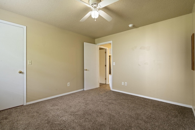 1813 Boswell Ave, Branson, MO 65616 - unfurnished bedroom with carpet flooring, a textured ceiling, and a ceiling fan