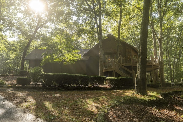 636 Crader Ct, Springfield, MO 65802 - back of property with a deck and stairway