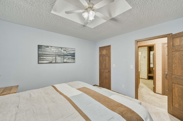 636 Crader Ct, Springfield, MO 65802 - bedroom featuring a textured ceiling, carpet flooring, and a ceiling fan