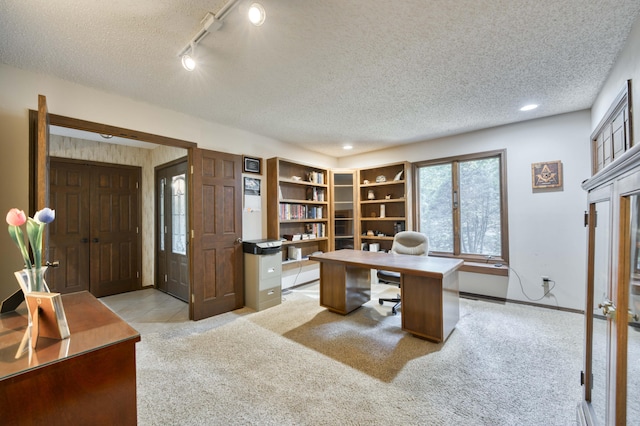 636 Crader Ct, Springfield, MO 65802 - home office with light colored carpet, rail lighting, a textured ceiling, and recessed lighting