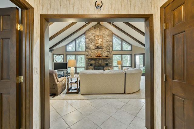 636 Crader Ct, Springfield, MO 65802 - living area with beamed ceiling, healthy amount of natural light, a fireplace, light tile patterned flooring, and high vaulted ceiling