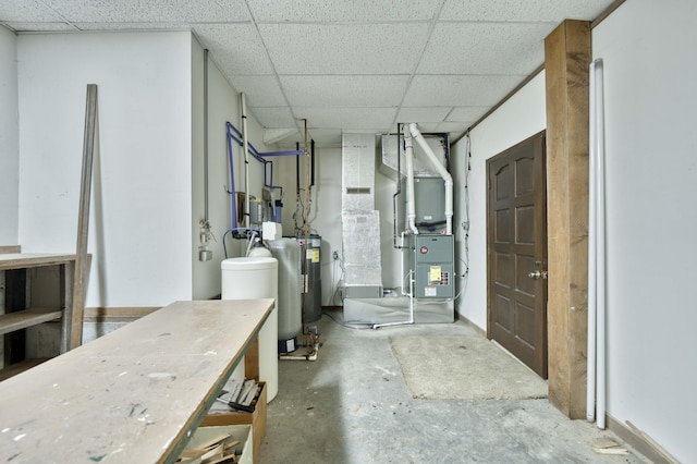 636 Crader Ct, Springfield, MO 65802 - basement with a drop ceiling, heating unit, and a water softener