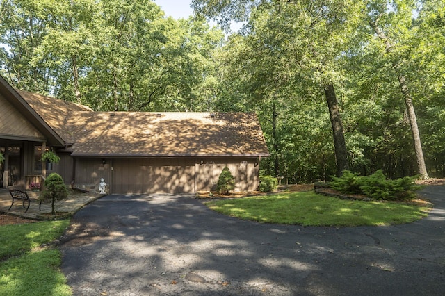 636 Crader Ct, Springfield, MO 65802 - view of front of house with asphalt driveway and a shingled roof