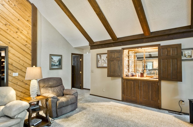 636 Crader Ct, Springfield, MO 65802 - living area with high vaulted ceiling, beamed ceiling, and light colored carpet