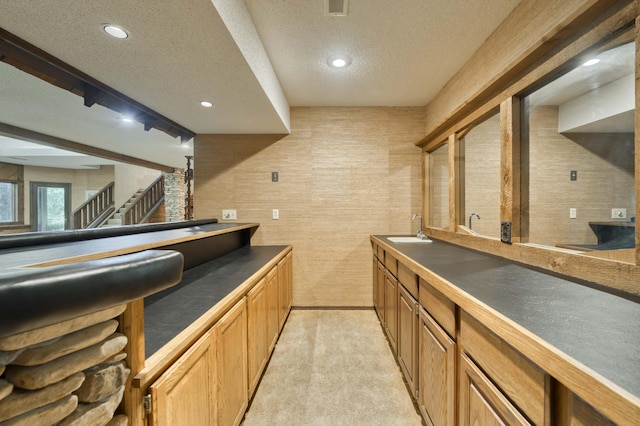 636 Crader Ct, Springfield, MO 65802 - bar with a textured ceiling, recessed lighting, stairway, and light colored carpet