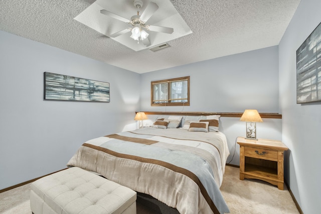636 Crader Ct, Springfield, MO 65802 - carpeted bedroom featuring a textured ceiling and a ceiling fan