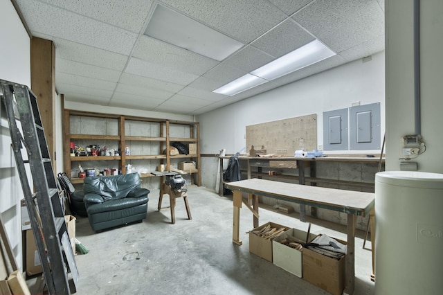 636 Crader Ct, Springfield, MO 65802 - below grade area featuring electric panel, a workshop area, and a drop ceiling
