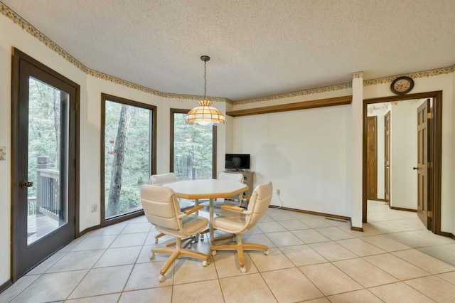 636 Crader Ct, Springfield, MO 65802 - dining room with a textured ceiling and light tile patterned floors