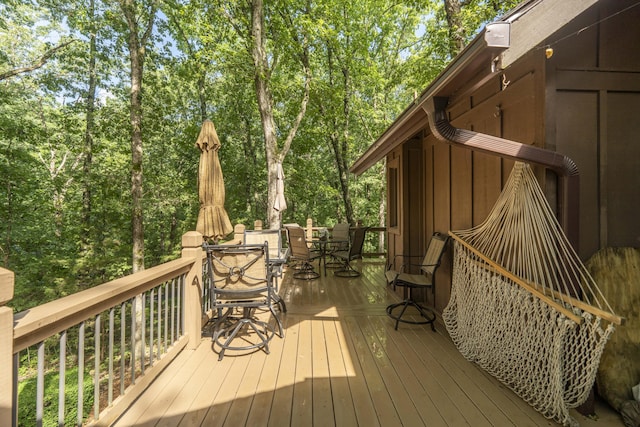 636 Crader Ct, Springfield, MO 65802 - wooden deck featuring outdoor dining space