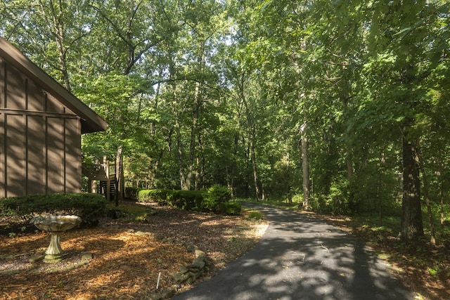 636 Crader Ct, Springfield, MO 65802 - view of asphalt driveway with a wooded view