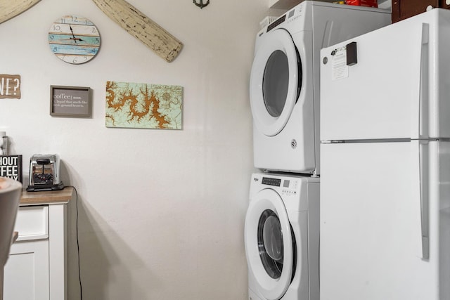 440 Fall Creek Dr Unit 7, Branson, MO 65616 - laundry room featuring estacked washer and dryer