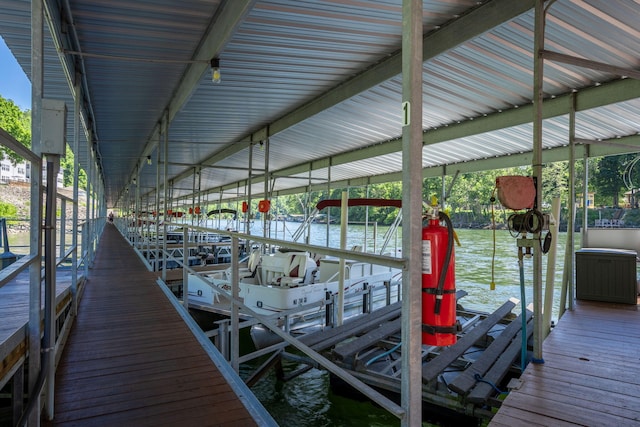 440 Fall Creek Dr Unit 7, Branson, MO 65616 - dock area featuring boat lift and a water view