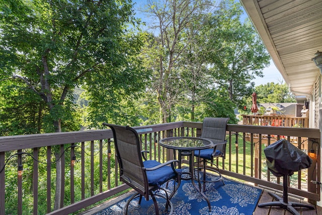 440 Fall Creek Dr Unit 7, Branson, MO 65616 - wooden deck with view of wooded area