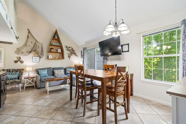 440 Fall Creek Dr Unit 7, Branson, MO 65616 - dining space featuring light tile patterned flooring, a chandelier, and lofted ceiling