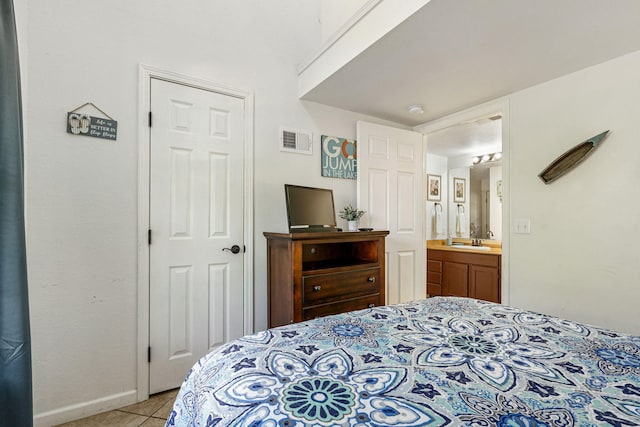 440 Fall Creek Dr Unit 7, Branson, MO 65616 - bedroom with light tile patterned flooring and a sink
