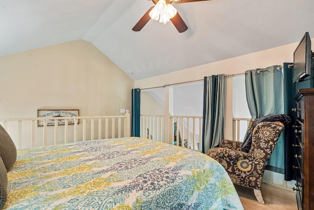 440 Fall Creek Dr Unit 7, Branson, MO 65616 - bedroom featuring vaulted ceiling, wood finished floors, and ceiling fan
