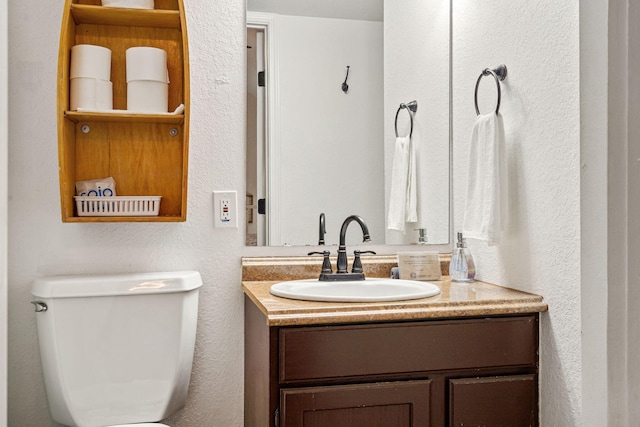 440 Fall Creek Dr Unit 7, Branson, MO 65616 - bathroom featuring vanity and toilet