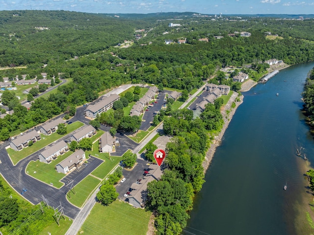 440 Fall Creek Dr Unit 7, Branson, MO 65616 - aerial view of property's location featuring a heavily wooded area and a nearby body of water