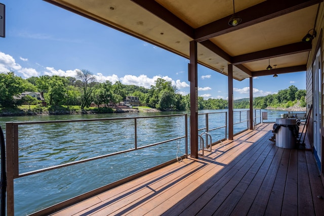 440 Fall Creek Dr Unit 7, Branson, MO 65616 - dock area with a water view, a balcony, and view of scattered trees