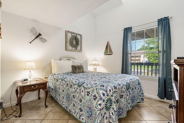 440 Fall Creek Dr Unit 7, Branson, MO 65616 - bedroom featuring tile patterned floors and lofted ceiling