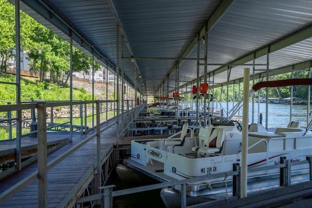 440 Fall Creek Dr Unit 7, Branson, MO 65616 - dock featuring a water view and boat lift