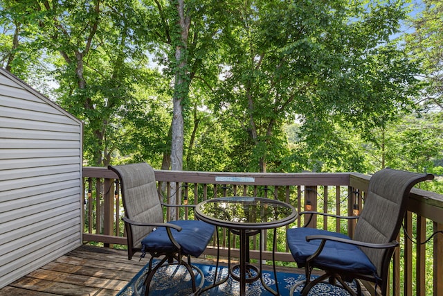 440 Fall Creek Dr Unit 7, Branson, MO 65616 - wooden terrace with outdoor dining area