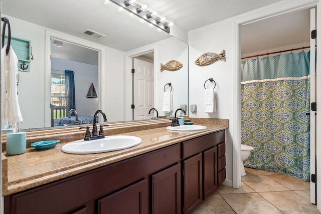 440 Fall Creek Dr Unit 7, Branson, MO 65616 - bathroom with double vanity and tile patterned flooring