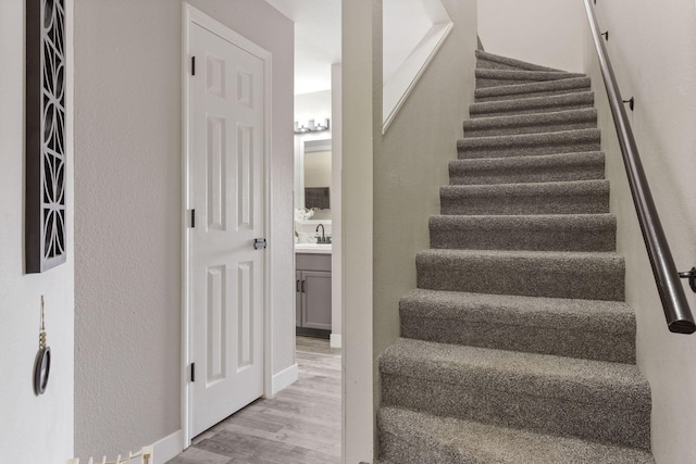 530 Abby Ln Unit 5, Branson, MO 65616 - stairs with wood finished floors and baseboards